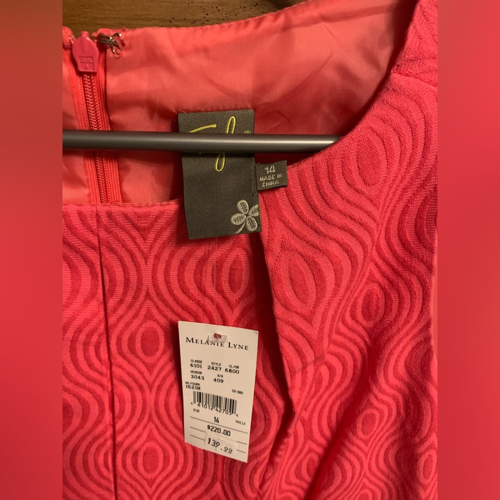 Dress from Laura.  Size 14 but fits like a 12.  Beautiful hot pink colour.